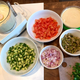 Illustration for article titled Take your summer 7-layer dip to the Mediterranean
